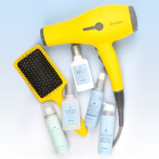 A limited-edition set filled with everything you need for gorgeous hair, including Buttercup Blow-Dryer and The Lemon Bar Paddle Brush.
Featuring Drybar's iconic Buttercup Blow-Dryer and the Liquid Glass Collection, this set will help you achieve smooth, sleek, glassy hair that will last up to three washes with the addition of the Liquid Glass Miracle Smoothing Sealant!