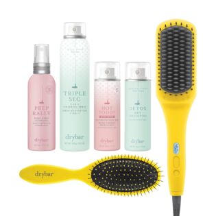 A deluxe set featuring The Brush Crush Heated Straightening Brush and full and travel sizes of other smooth hair essentials.