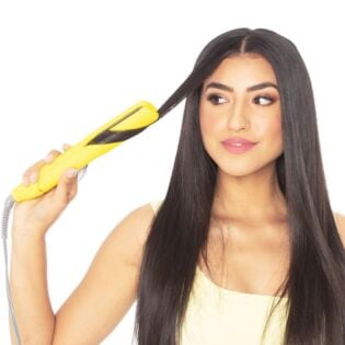 This dual-purpose iron allows you to quickly style even the thickest hair into super-sleek straight looks or add a bit of wave or curl.